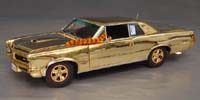 Click image to see more information about our 8th Anniversary Official Pontiac Die Cast Commemorative Collectible 1965 GTO Hurst Edition in gold plated